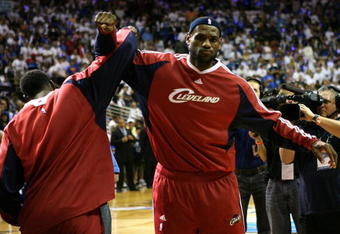 ORLANDO, FL - MAY 30: LeBron James #23 of the Cleveland Cavaliers locks arms with teammate Ben Wallace #4 before Game Six of the Eastern Conference Finals against the Orlando Magic during the 2009 Playoffs at Amway Arena on May 30, 2009 in Orlando, Florida. NOTE TO USER: User expressly acknowledges and agrees that, by downloading and or using this photograph, User is consenting to the terms and conditions of the Getty Images License Agreement  (Photo by Elsa/Getty Images)