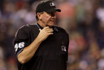 KANSAS CITY, KS - SEPTEMBER 21:  MLB Home plate umpire Tim McClelland #36 looks on during the game between the Boston Red Sox and the Kansas City Royals on September 21, 2009 at Kauffman Stadium in Kansas City, Missouri. The Royals defeated the Red Sox 12-9. (Photo by Jamie Squire/Getty Images)