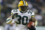 PHILADELPHIA - JANUARY 11:  Running back Ahman Green #30 of the Green Bay Packers carries the football for 33-yards against the Philadelphia Eagles in the second quarter during the NFC divisional playoffs on January 11, 2004 at Lincoln Financial Field in Philadelphia, Pennsylvania.  (Photo by Doug Pensinger/Getty Images)  