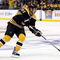 BOSTON - OCTOBER 10:  Marc Savard #91 of the Boston Bruins takes the puck to the net against the New York Islanders to score the game winner in the overtime shootout on October 10, 2009 at the TD Garden in Boston, Massachusetts. The Bruins defeated the Islanders 4-3 in an overtime shootout.  (Photo by Elsa/Getty Images)