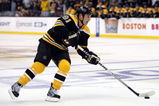 BOSTON - OCTOBER 10:  Marc Savard #91 of the Boston Bruins takes the puck to the net against the New York Islanders to score the game winner in the overtime shootout on October 10, 2009 at the TD Garden in Boston, Massachusetts. The Bruins defeated the Islanders 4-3 in an overtime shootout.  (Photo by Elsa/Getty Images)