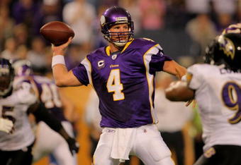 MINNEAPOLIS - OCTOBER 18:  Quarterback Brett Favre #4 of the Minnesota Vikings prepares to deliver a pass against the Baltimore Ravens during NFL action at Hubert H. Humphrey Metrodome on October 18, 2009 in Minneapolis, Minnesota. Te Vikings defeated the Ravens 33-31.  (Photo by Doug Pensinger/Getty Images)