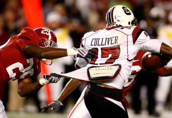 TUSCALOOSA - OCTOBER 17:  Return man Chris Culliver #17 of the South Carolina Gamecocks is tackled by special teams defender Terry Grant #29 of the Alabama Crimson Tide at Bryant-Denny Stadium on October 17, 2009 in Tuscaloosa, Alabama. The Crimson Tide beat the Gamecocks 20-6.  (Photo by Mike Zarrilli/Getty Images)