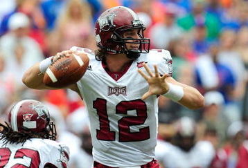 GAINESVILLE, FL - SEPTEMBER 12:  Levi Brown #12 of the Troy Trojans attempts a pass during the game against the Florida Gators at Ben Hill Griffin Stadium on September 12, 2009 in Gainesville, Florida.  (Photo by Sam Greenwood/Getty Images)