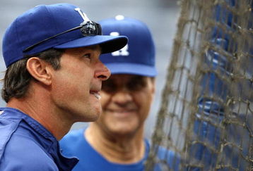 ATLANTA - APRIL 18: Special assignment coach Don Mattingly of the Los Angeles Dodgers watches batting practice as manager Joe Torre #6 looks on before the game against the Atlanta Braves on April 18, 2008 at Turner Field in Atlanta, Georgia.  The Braves beat the Dodgers 6-1.  (Photo by Mike Zarrilli/Getty Images)