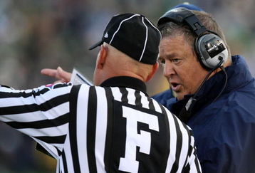SOUTH BEND, IN - OCTOBER 17: Head coach Charlie Weis of the Notre Dame Fighting Irish speaks to the referee during the third quarter against the USC Trojans at Notre Dame Stadium on October 17, 2009 in South Bend, Indiana. (Photo by Jonathan Daniel/Getty Images)