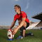 TOULON, FRANCE - JULY 15:  Jonny Wilkinson, the England standoff, who has recently joined Toulon, places the ball on the kicking tee as he takes part in kicking practice at the Stade Felix Mayol on July 15, 2009 in Toulon, France.  (Photo by David Rogers/Getty Images)