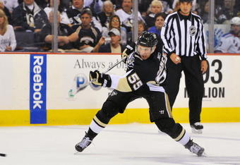 PITTSBURGH - OCTOBER 2:  Sergei Gonchar #55 of the Pittsburgh Penguins shoots the puck against the New York Rangers on October 2, 2009 at Mellon Arena in Pittsburgh, Pennsylvania.  (Photo by Jamie Sabau/Getty Images)