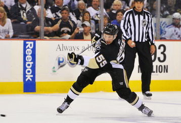 PITTSBURGH - OCTOBER 2:  Sergei Gonchar #55 of the Pittsburgh Penguins shoots the puck against the New York Rangers on October 2, 2009 at Mellon Arena in Pittsburgh, Pennsylvania.  (Photo by Jamie Sabau/Getty Images)