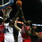 LONDON, ENGLAND - OCTOBER 06:  Chicago Bulls and  Utah Jazz players jump for the rebound during the NBA pre-season game as part of the 2009 NBA Europe Live Tour between Chicago Bulls and Utah Jazz at the O2 Arena on October 6, 2009 in London, England.  NOTE TO USER: User expressly acknowledges and agrees that, by downloading and/or using this Photograph, user is consenting to the terms and conditions of the Getty Images License Agreement.  (Photo by Clive Rose/Getty Images)