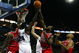 LONDON, ENGLAND - OCTOBER 06:  Chicago Bulls and  Utah Jazz players jump for the rebound during the NBA pre-season game as part of the 2009 NBA Europe Live Tour between Chicago Bulls and Utah Jazz at the O2 Arena on October 6, 2009 in London, England.  NOTE TO USER: User expressly acknowledges and agrees that, by downloading and/or using this Photograph, user is consenting to the terms and conditions of the Getty Images License Agreement.  (Photo by Clive Rose/Getty Images)