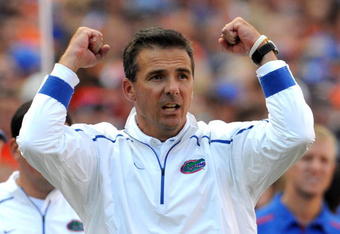 GAINESVILLE, FL - OCTOBER 17: Coach Urban Meyer of the Florida Gators directs play against the University of Arkansas Razorbacks October 17, 2009 at Ben Hill Griffin Stadium in Gainesville, Florida.  (Photo by Al Messerschmidt/Getty Images)
