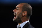 BARCELONA, SPAIN - OCTOBER 20:  Coach Josep Guardiola of FC Barcelona shouts to his players during the UEFA Champions League group F match between FC Barcelona and FC Rubin Kazan at the Camp Nou Stadium on October 20, 2009 in Barcelona, Spain. Barcelona lost the match 2-1.  (Photo by Jasper Juinen/Getty Images)