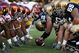 SOUTH BEND, IN - OCTOBER 17: Braxston Cave #52 of the Notre Dame Fighting Irish prepares to snap the ball against the USC Trojans during the second quarter at Notre Dame Stadium on October 17, 2009 in South Bend, Indiana. (Photo by Jonathan Daniel/Getty Images)