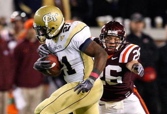 ATLANTA - OCTOBER 17:  Jonathan Dwyer #21 of the Georgia Tech Yellow Jackets against Cody Grimm #26 of the Virginia Tech Hokies at Bobby Dodd Stadium on October 17, 2009 in Atlanta, Georgia.  (Photo by Kevin C. Cox/Getty Images)
