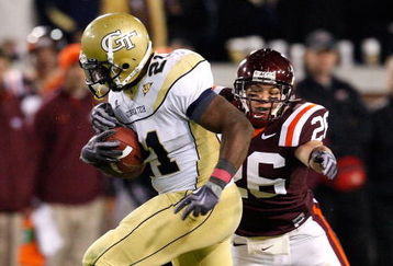 ATLANTA - OCTOBER 17:  Jonathan Dwyer #21 of the Georgia Tech Yellow Jackets against Cody Grimm #26 of the Virginia Tech Hokies at Bobby Dodd Stadium on October 17, 2009 in Atlanta, Georgia.  (Photo by Kevin C. Cox/Getty Images)