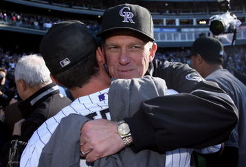 DENVER - OCTOBER 01:  Manager Jim Tracy (R) and closer Huston Street (L) of the Colorado Rockies celebrate after they defeated the Milwaukee Brewers at Coors Field on October 1, 2009 in Denver, Colorado. The Rockies defeated the Brewers 9-2 and clinched a National League playoff berth.  (Photo by Doug Pensinger/Getty Images)