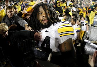 STATE COLLEGE, PA - SEPTEMBER 26:  Adrian Clayborn #94 of the Iowa Hawkeyes celebrates a 21-10 victory over the Penn State Nittnay Lions on September 26, 2009 at Beaver Stadium in State College, Pennsylvania.  (Photo by Gregory Shamus/Getty Images)