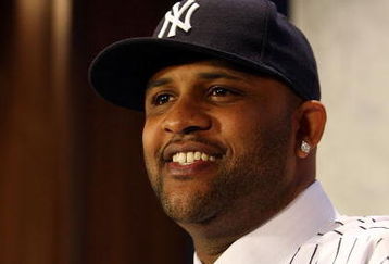 NEW YORK - DECEMBER 18:  CC Sabathia talks to the media during a press conference to announce his signing to the New York Yankees at Yankee Stadium on December 18, 2008  in the Bronx borough of New York City.  (Photo by Nick Laham/Getty Images)