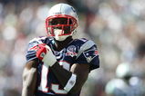 EAST RUTHERFORD, NJ - SEPTEMBER 20:  Joey Galloway #13 of the New England Patriots grabs his jersey against the New York Jets at Giants Stadium on September 20, 2009 in East Rutherford, New Jersey.  (Photo by Nick Laham/Getty Images)