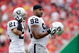 KANSAS CITY, MO - SEPTEMBER 20:  Defensive end Richard Seymour #92 of the Oakland Raiders walks onto the field with Nnamdi Asomugha #21 during the game against the Kansas City Chiefs at Arrowhead Stadium on September 20, 2009 in Kansas City, Missouri.  (Photo by Jamie Squire/Getty Images)