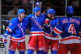NEW YORK - OCTOBER 3: Brandon Dubinsky #17 of the New York Rangers is congratulated by Vinny Prospal #20, Michal Rozsival #33, and Michael Del Zotto #4, after scoring a second period goal against the Ottawa Senators at Madison Square Garden on October 3, 2009 in New York City. (Photo by Christopher Pasatieri/Getty Images)
