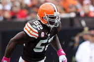 CLEVELAND - OCTOBER 04: Daniel Coats #86 of the Cincinnati Bengals runs the ball against D'Qwell Jackson #52 of the Cleveland Browns during their game at Cleveland Browns Stadium on October 4, 2009 in Cleveland, Ohio. The Bengals defeated the Browns 23-20 in overtime. (Photo by Jim McIsaac/Getty Images)