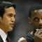 ATLANTA - APRIL 29:  Head coach Erik Spoelstra talks with Mario Chalmers #6 of the Miami Heat while taking on the Atlanta Hawks during Game Five of the Eastern Conference Quarterfinals at Philips Arena on April 29, 2009 in Atlanta, Georgia. NOTE TO USER: User expressly acknowledges and agrees that, by downloading and/or using this Photograph, user is consenting to the terms and conditions of the Getty Images License Agreement.  (Photo by Doug Benc/Getty Images)