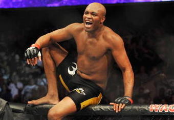 PHILADELPHIA - AUGUST 08:  Anderson Silva celebrates after defeating Forrest Griffin during their light heavyweight bout at UFC 101: Declaration at the Wachovia Center on August 8, 2009 in Philadelphia, Pennsylvania.  (Photo by Jon Kopaloff/Getty Images)