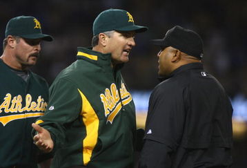 LOS ANGELES, CA - JUNE 16:  Oakland Athletics manager Bob Geren argues with the first base umpire during the game against the Los Angeles Dodgers at Dodger Stadium on June 16, 2009 in Los Angeles, California.  (Photo by Jeff Gross/Getty Images)