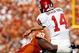 DALLAS - OCTOBER 17:  Quarterback Sam Bradford #14 of the Oklahoma Sooners is tackled by Lamarr Houston #33 of the Texas Longhorns at Cotton Bowl on October 17, 2009 in Dallas, Texas.  (Photo by Ronald Martinez/Getty Images)