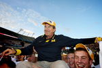 ORLANDO, FL - JANUARY 01:  Head coach Lloyd Carr of the Michigan Wolverines is carried off the field after ending his coaching career with a victory over the Florida Gators in the Capital One Bowl at Florida Citrus Bowl on January 1, 2008 in Orlando, Florida. Michigan defeated Florida 41-35.  (Photo by Doug Benc/Getty Images)