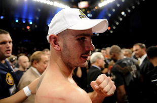 ATLANTIC CITY, NJ - OCTOBER 18: Kelly Pavlik of Youngstown, Ohio acknowledges the crowd after his loss to Bernard Hopkins of Philadelphia, Pennsylvania after their light heavyweight bout at Boardwalk Hall on October 18, 2008 in Atlantic City, New Jersey. (Photo by Jeff Zelevansky/Getty Images)