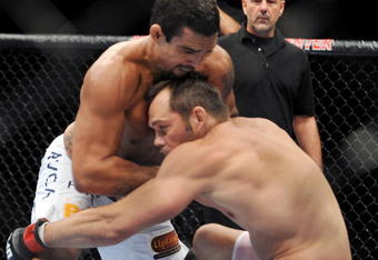 DALLAS - SEPTEMBER 19:  UFC fighter Vitor Belfort  (L) battles UFC fighter Rich Franklin (R) during their Catch weight bout at UFC 103: Franklin vs. Belfort at the American Airlines Center on September 19, 2009 in Dallas, Texas.  (Photo by Jon Kopaloff/Getty Images)