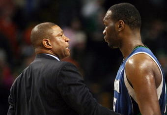 BOSTON - FEBRUARY 01:  Head coach Doc Rivers of the Boston Celtics talks to Al Jefferson #25 of Minnesota Timberwolves after the game on February 1, 2009 at TD Banknorth Garden in Boston, Massachusetts. The Celtics defeated the Minnesota Timberwolves 109-101. NOTE TO USER: User expressly acknowledges and agrees that, by downloading and or using this Photograph, user is consenting to the terms and conditions of the Getty Images License Agreement.  (Photo by Elsa/Getty Images)