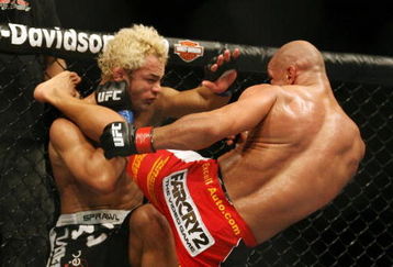 CHICAGO- OCTOBER 25:  Josh Koscheck (L) fights Thiago Alves in a Welterweight bout  at UFC's Ultimate Fight Night at Allstate Arena on October 25, 2008 in Chicago, Illinois. (Photo by Tasos Katopodis/Getty Images)
