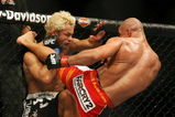 CHICAGO- OCTOBER 25:  Josh Koscheck (L) fights Thiago Alves in a Welterweight bout  at UFC's Ultimate Fight Night at Allstate Arena on October 25, 2008 in Chicago, Illinois. (Photo by Tasos Katopodis/Getty Images)