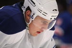 NEW YORK - OCTOBER 12: Luke Schenn #2 of the Toronto Maple Leafs looks on during a break in NHL game action against the New York Rangers at Madison Square Garden on October 12, 2009 in New York City.  (Photo by Nick Laham/Getty Images)