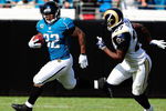 JACKSONVILLE, FL - OCTOBER 18:  Maurice Jones-Drew #32 of the Jacksonville Jaguars is chased by David Roach #27 of the St. Louis Rams during the game at Jacksonville Municipal Stadium on October 18, 2009 in Jacksonville, Florida.  (Photo by Sam Greenwood/Getty Images)
