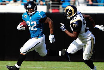 JACKSONVILLE, FL - OCTOBER 18:  Maurice Jones-Drew #32 of the Jacksonville Jaguars is chased by David Roach #27 of the St. Louis Rams during the game at Jacksonville Municipal Stadium on October 18, 2009 in Jacksonville, Florida.  (Photo by Sam Greenwood/Getty Images)