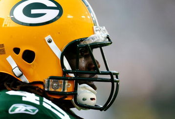 GREEN BAY, WI - AUGUST 15:  Fullback Quinn Johnson #45 of the Green Bay Packers looks on before taking on the Cleveland Browns during the preseason game at Lambeau Field on August 15, 2009 in Green Bay, Wisconsin. (Photo by Jonathan Daniel/Getty Images)