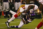 MINNEAPOLIS - SEPTEMBER 27: Takeo Spikes #51 of the San Francisco 49ers tackles Sidney Rice #18 of the Minnesota Vikings at the Hubert H. Humphrey Metrodome on September 27, 2009 in Minneapolis, Minnesota. The Vikings defeated the 49ers 27-24.  (Photo by Jonathan Daniel/Getty Images)