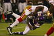 MINNEAPOLIS - SEPTEMBER 27: Takeo Spikes #51 of the San Francisco 49ers tackles Sidney Rice #18 of the Minnesota Vikings at the Hubert H. Humphrey Metrodome on September 27, 2009 in Minneapolis, Minnesota. The Vikings defeated the 49ers 27-24.  (Photo by Jonathan Daniel/Getty Images)