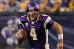 MINNEAPOLIS - OCTOBER 18:  Quarterback Brett Favre #4 of the Minnesota Vikings rolls out to deliver a pass against the Baltimore Ravens during NFL action at Hubert H. Humphrey Metrodome on October 18, 2009 in Minneapolis, Minnesota. Te Vikings defeated the Ravens 33-31.  (Photo by Doug Pensinger/Getty Images)