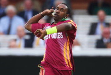 LONDON, ENGLAND - JUNE 12: Dwayne Bravo of West Indies bowls during the ICC World Twenty20 Super Eights match between India and West Indies at Lord's on June 12, 2009 in London, England.  (Photo by Tom Shaw/Getty Images)