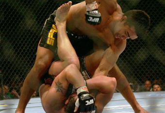 MANCHESTER, UNITED KINGDOM - APRIL 21: Lyoto Machida of Brazil and David Heath of England in action during a Welterweight bout of the Ultimate Fighting Championship at the Manchester Evening News Arena on April 21, 2007 in Manchester, England. (Photo by Gary M. Prior/Getty Images).