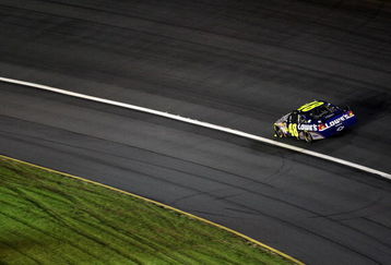 CONCORD, NC - OCTOBER 17:  Jimmie Johnson, driver of the #48 Lowe's Chevrolet, races during the NASCAR Sprint Cup Series NASCAR Banking 500 at Lowe's Motor Speedway on October 17, 2009 in Concord, North Carolina.  (Photo by Streeter Lecka/Getty Images)