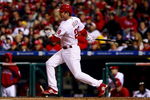PHILADELPHIA - OCTOBER 19:  Chase Utley #26 of the Philadelphia Phillies hits a RBI single to drive in Shane Victorino in the bottom of the sixth inning against the Los Angeles Dodgers in Game Four of the NLCS during the 2009 MLB Playoffs at Citizens Bank Park on October 19, 2009 in Philadelphia, Pennsylvania.  (Photo by Chris McGrath/Getty Images)