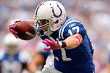 INDIANAPOLIS - OCTOBER 04:  Austin Collie #17 of the Indianapolis Colts runs with the ball during the NFL game against the Seattle Seahawks at Lucas Oil Stadium on October 4, 2009 in Indianapolis, Indiana.  (Photo by Andy Lyons/Getty Images)