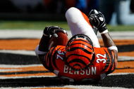 CINCINNATI, OH - OCTOBER 18: Running back Cedric Benson #32 of the Cincinnati Bengals lays on the field as he celebrates  a touchdown in the 2nd quarter against the Houston Texans at Paul Brown Stadium on October 18, 2009 in Cincinnati, Ohio. (Photo by Scott Boehm/Getty Images)